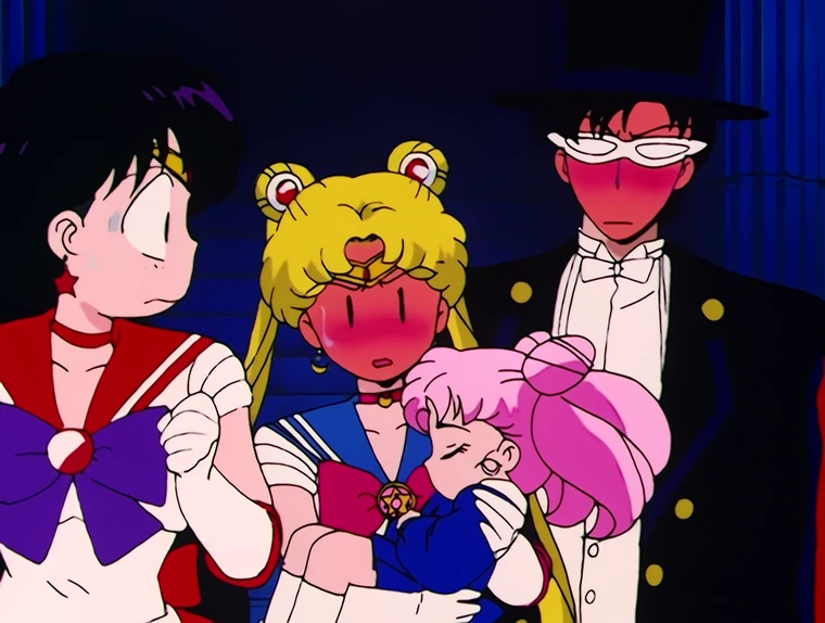 Usagi holding Chibiusa against her and blushing furiously, with Sailor Mars beside them and Tuxedo Mask behind