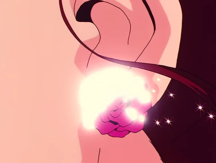 Close on one of Makoto&rsquo;s pink rose earrings, lit up.