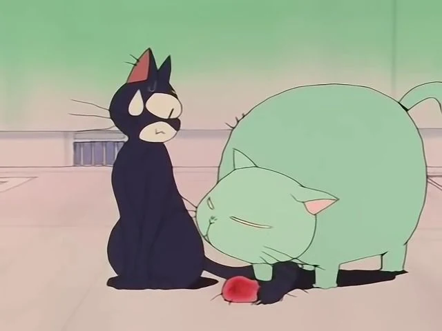 Rhett Butler leaning in beside Luna, who looks away, with a red rose at their feet
