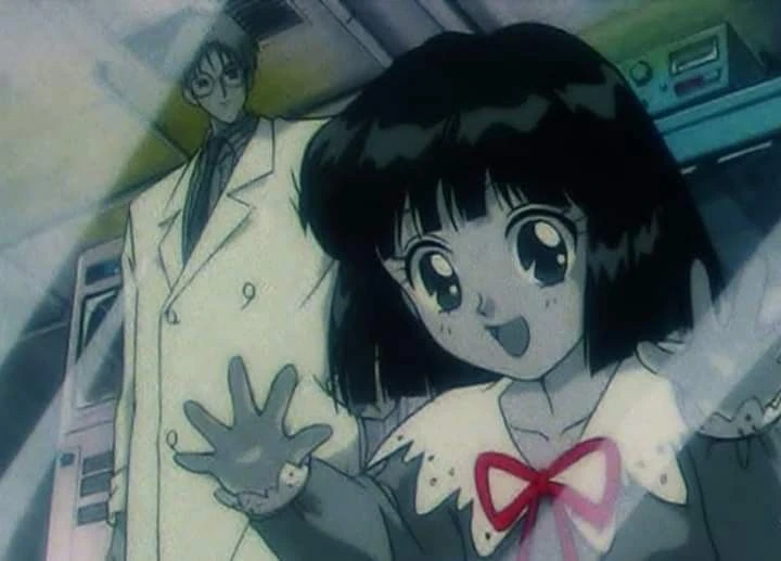 Hotaru in her school uniform reaching out with one hand and laughing, her father in a white coat standing behind her in the laboratory