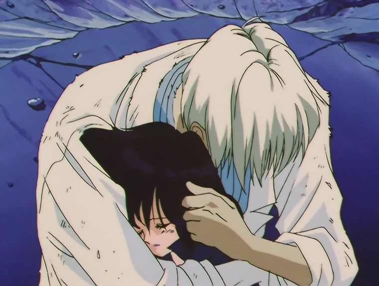 Professor Tomoe bent over Hotaru in the wrecked laboratory, her eyes closed against his shoulder and his hand cradling the back of her head