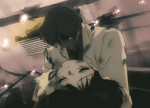 Professor Tomoe kneeling in the wreckage of the burning laboratory, holding Hotaru against him with embers falling around them