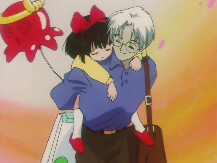 Professor Tomoe carrying a sleeping Hotaru on his back at sunset, a red balloon in her hand and shopping bags in his