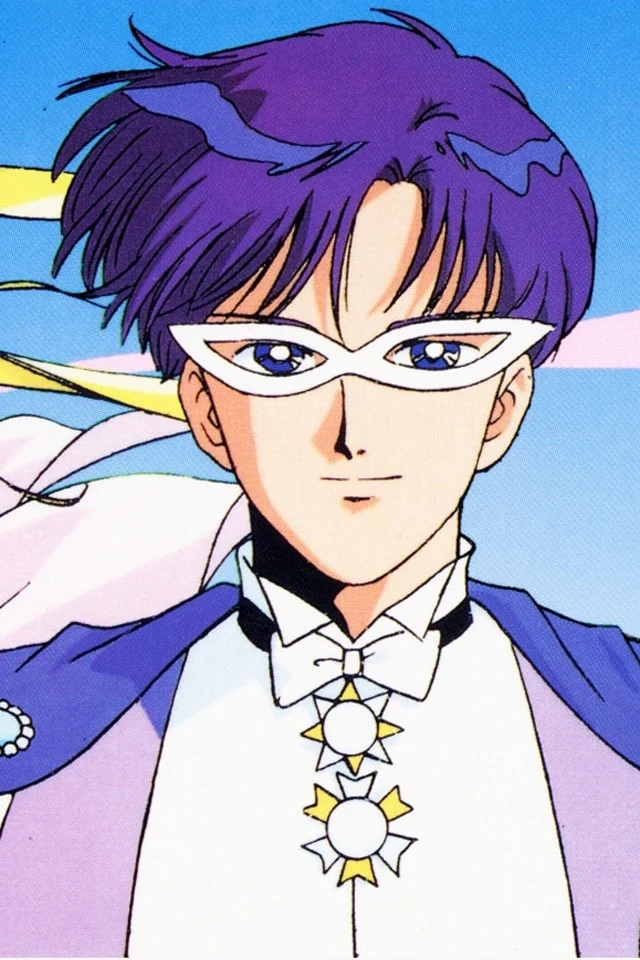 King Endymion in a white mask and white tuxedo with a lavender cape, against a blue sky