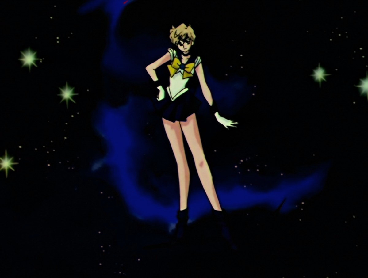 Sailor Uranus at the end of her transformation, one hand on her hip, standing against a dark starry sky, a cloud swirling behind her that turns from red to blue.