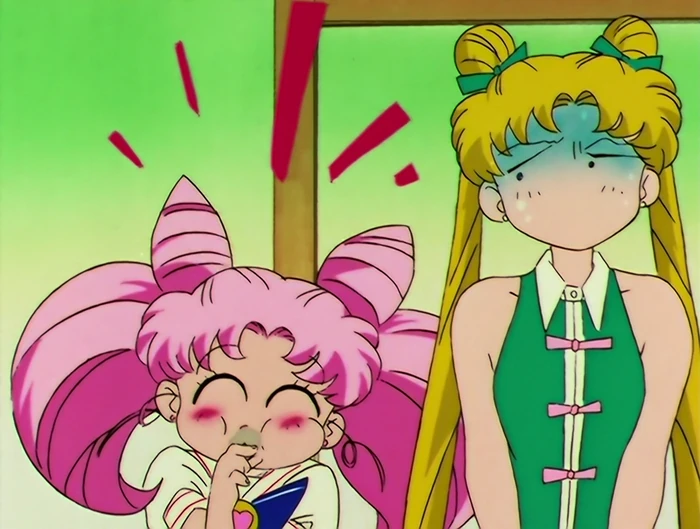 Chibiusa with her eyes shut and a finger to her nose, thoroughly pleased with herself, while Usagi glowers behind her with a shadow across her face