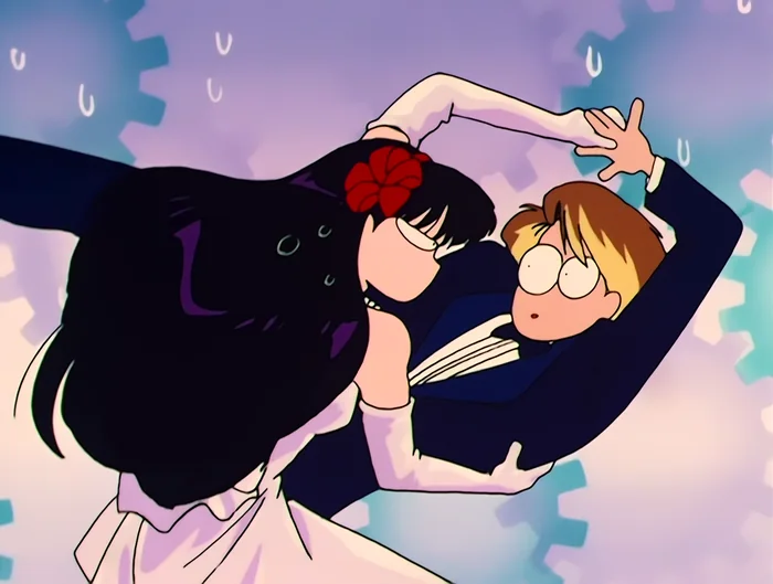 Rei dipped mid-dance by a boy in school uniform, wide-eyed, hearts in the air