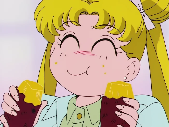 Usagi with her eyes squeezed shut in delight, cheeks pink, a roasted sweet potato in each hand