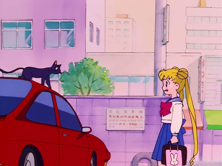 Usagi Tsukino and the cat with the crescent moon