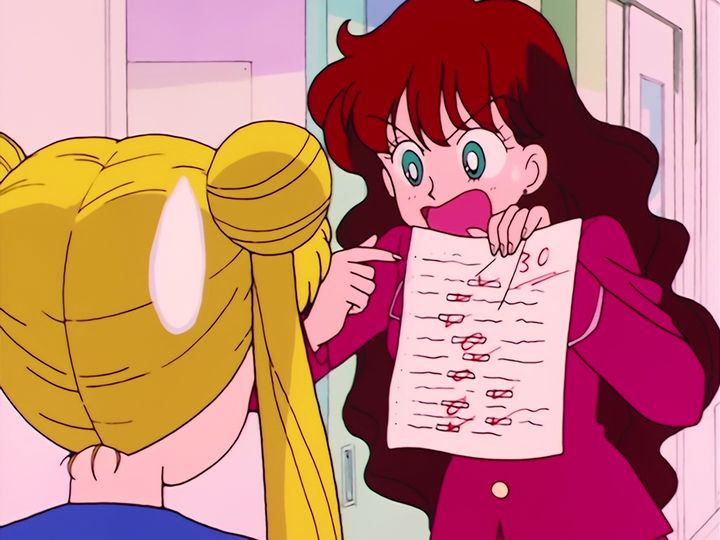 Usagi Tsukino and the cat with the crescent moon