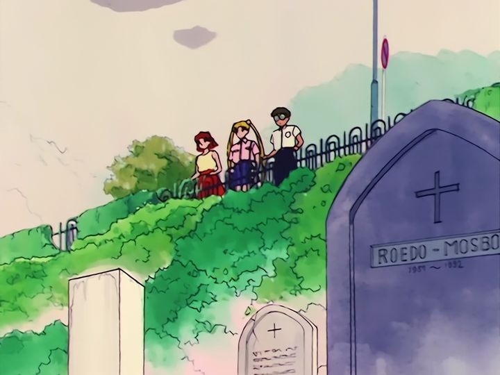 the cemetery, and the young man who sits down beside her