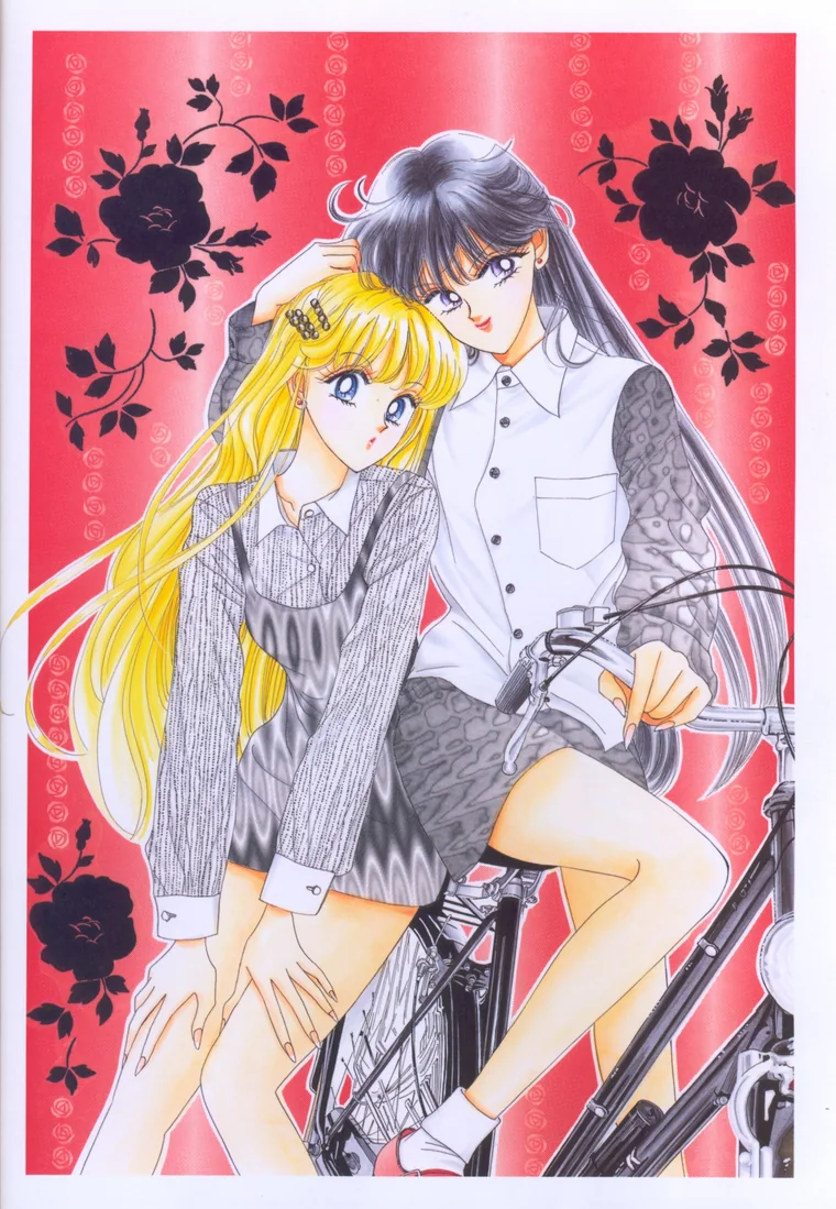 Rei seated on a bicycle with one hand on the handlebar, leaning over Minako and resting her other hand on Minako&rsquo;s head, against a red ground scattered with black roses