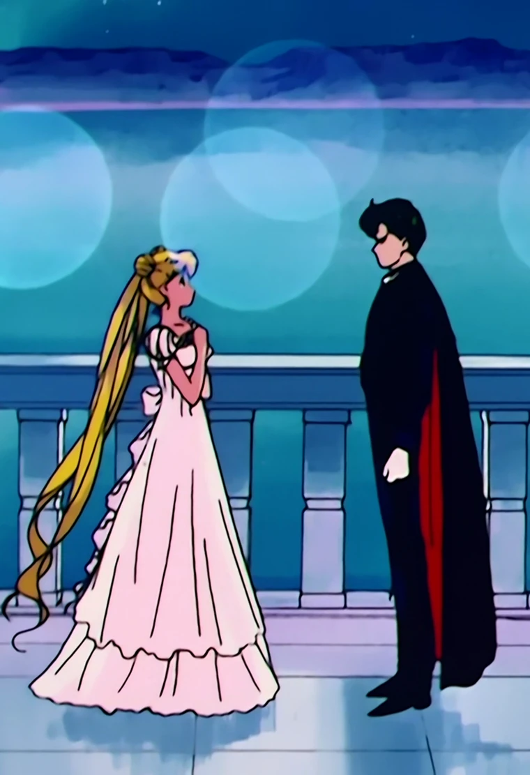 Princess Serenity in a pale gown facing Prince Endymion across a moonlit balcony, the Earth hanging in the sky behind them