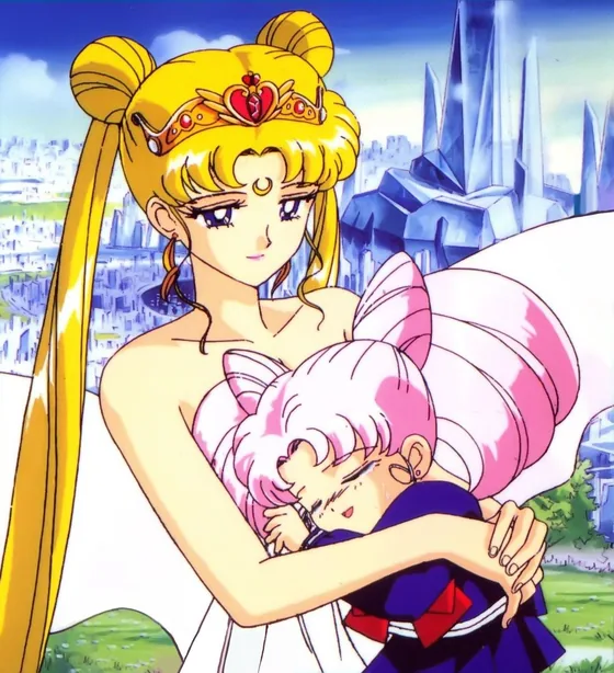 Neo-Queen Serenity in a white gown and gold crown holding a small pink-haired girl close against her shoulder, the crystal spires of a city rising behind them