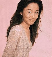 a portrait against pink