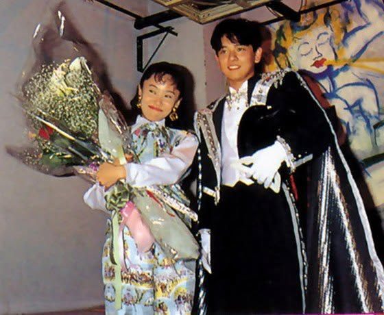 Naoko Takeuchi being given flowers at an event
